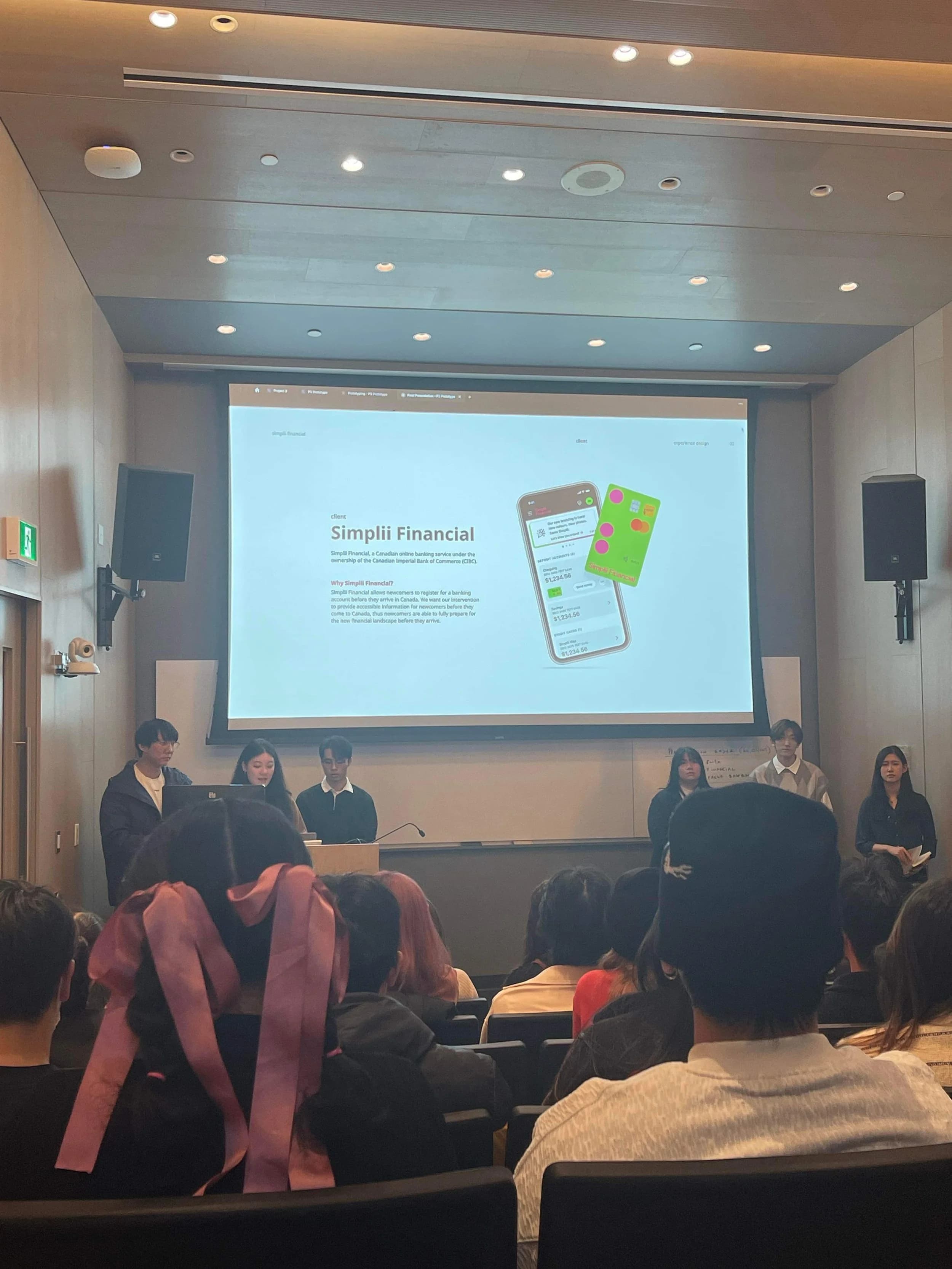 The team presenting the Simplii Financial project to an audience