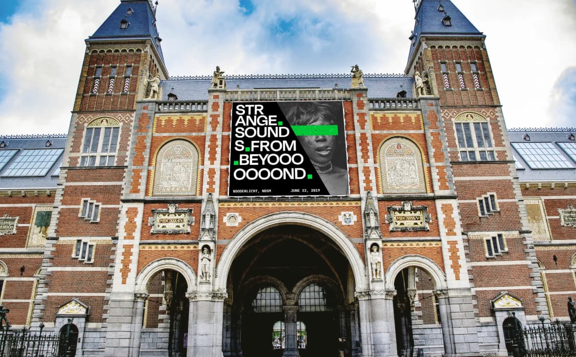 Strange Sounds From Beyond banner mockup on the Rijksmuseum facade